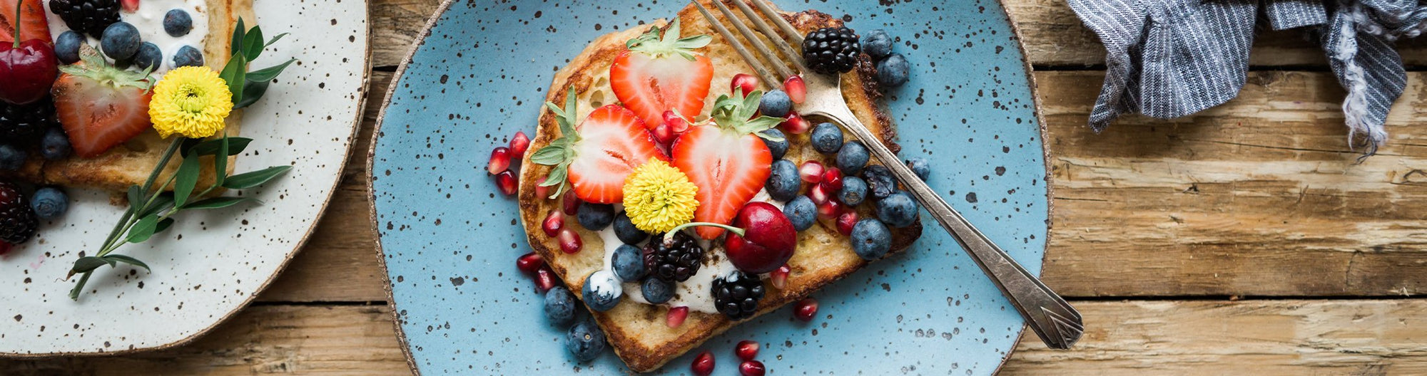 Toast with jam spread and berries. 